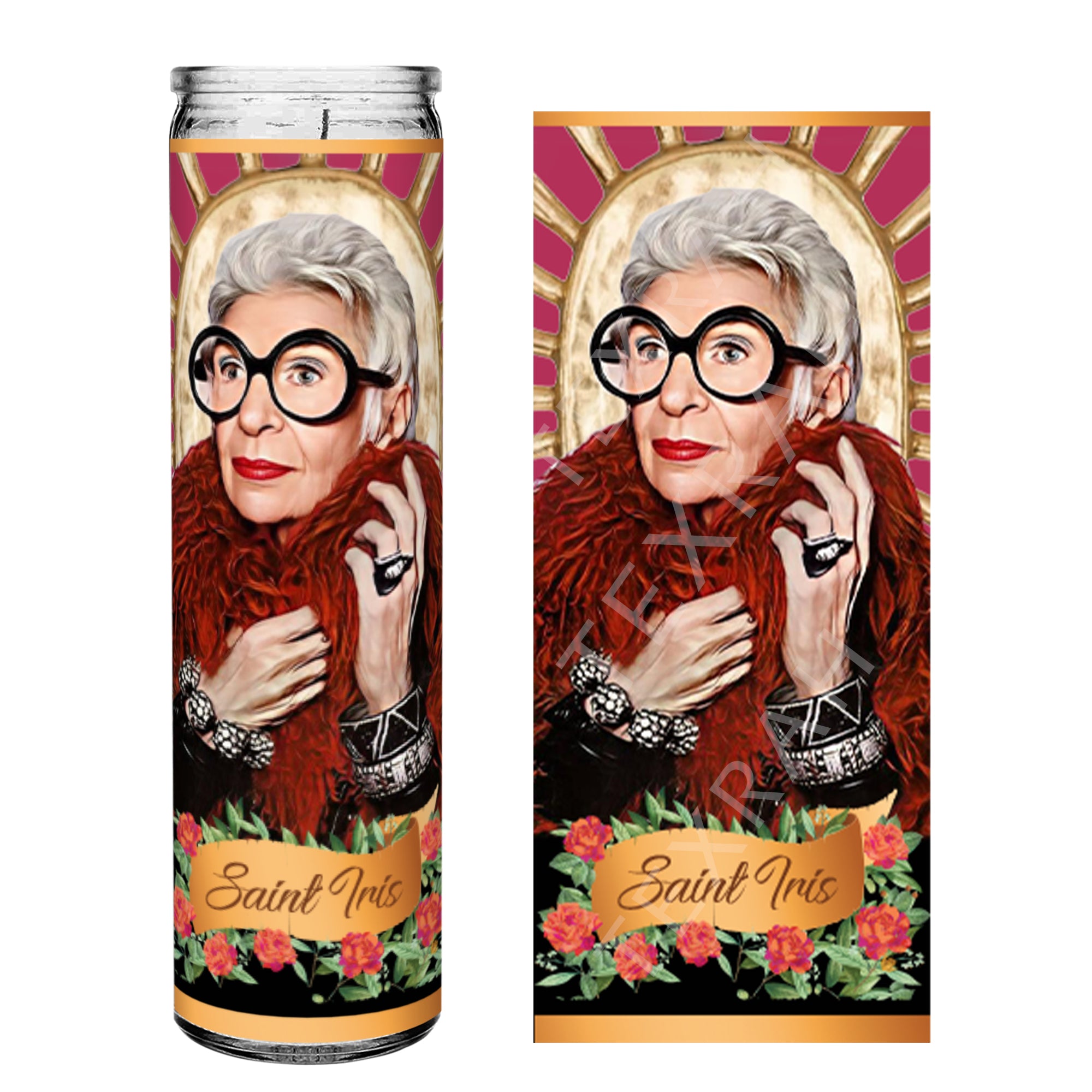 A prayer candle featuring an illustrated image of Iris Apfel depicted as a saint. She has short white hair, wears her iconic large round glasses, and is dressed in a bold red fur coat with various statement jewelry. A radiant golden halo is behind her head. The banner at the bottom reads 'Saint Iris,' surrounded by roses and greenery, with a vibrant pink and gold background.